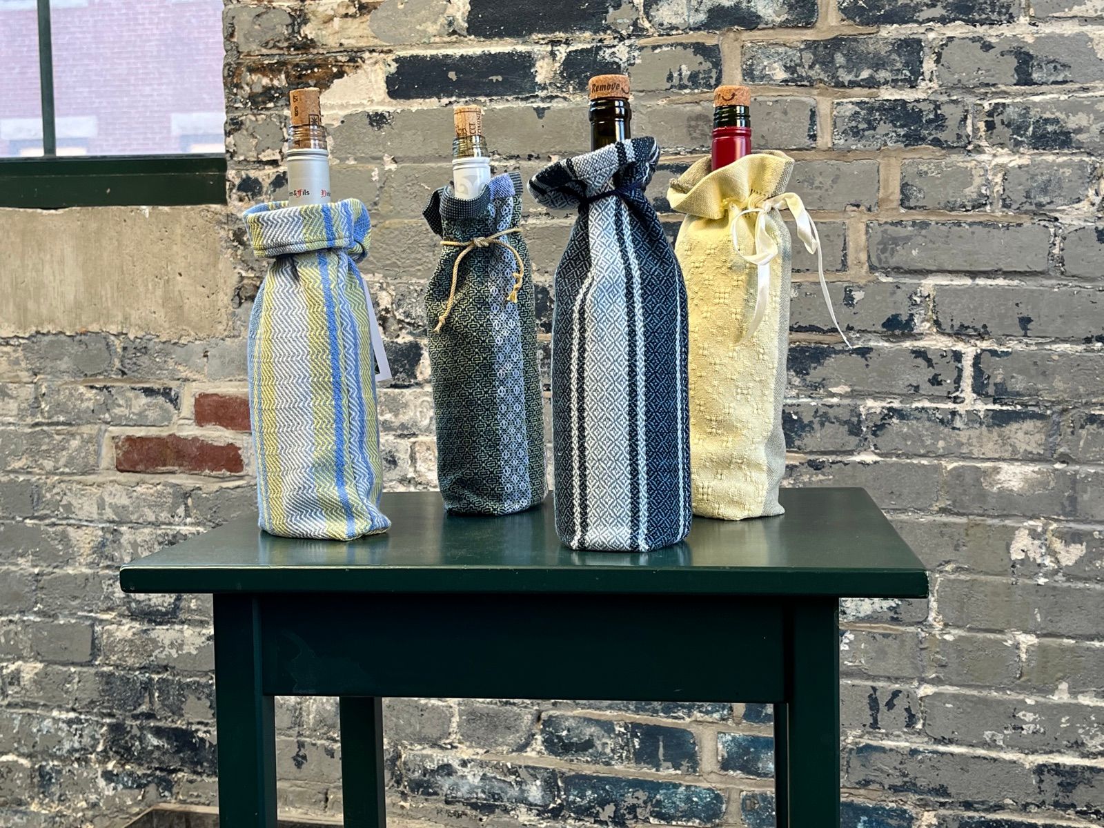 Wine bottle covers, woven by Ginny