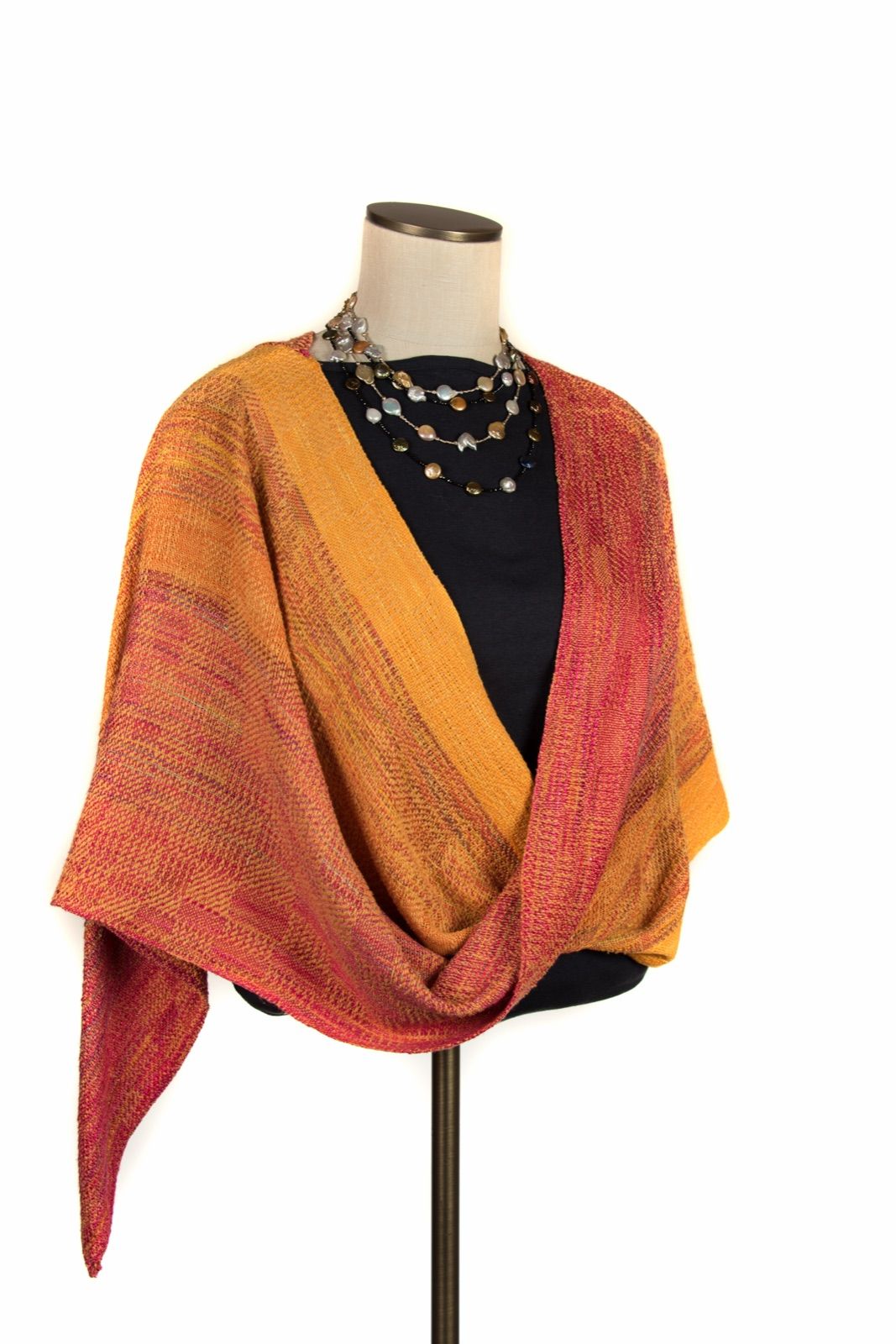 Hand-dyed mobius poncho in orange, woven by Mary