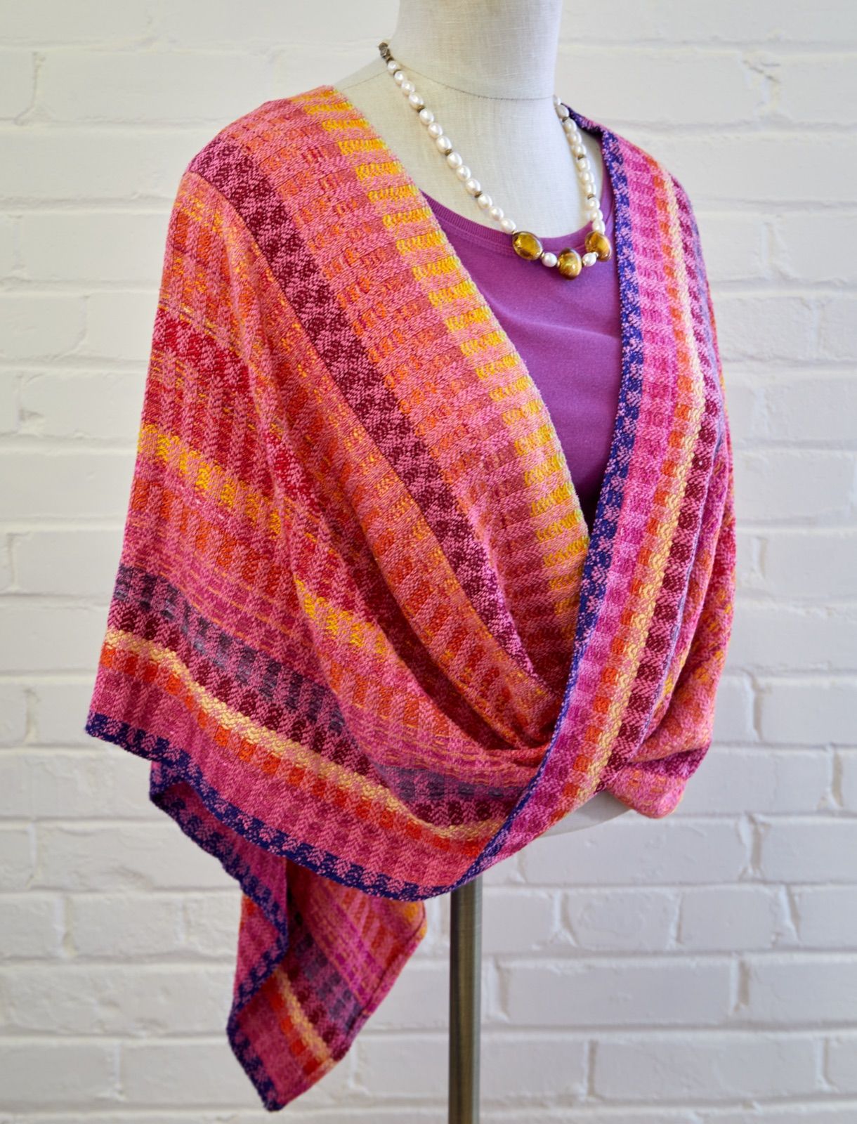 Mobius shawl in pink and orange, woven by Mary