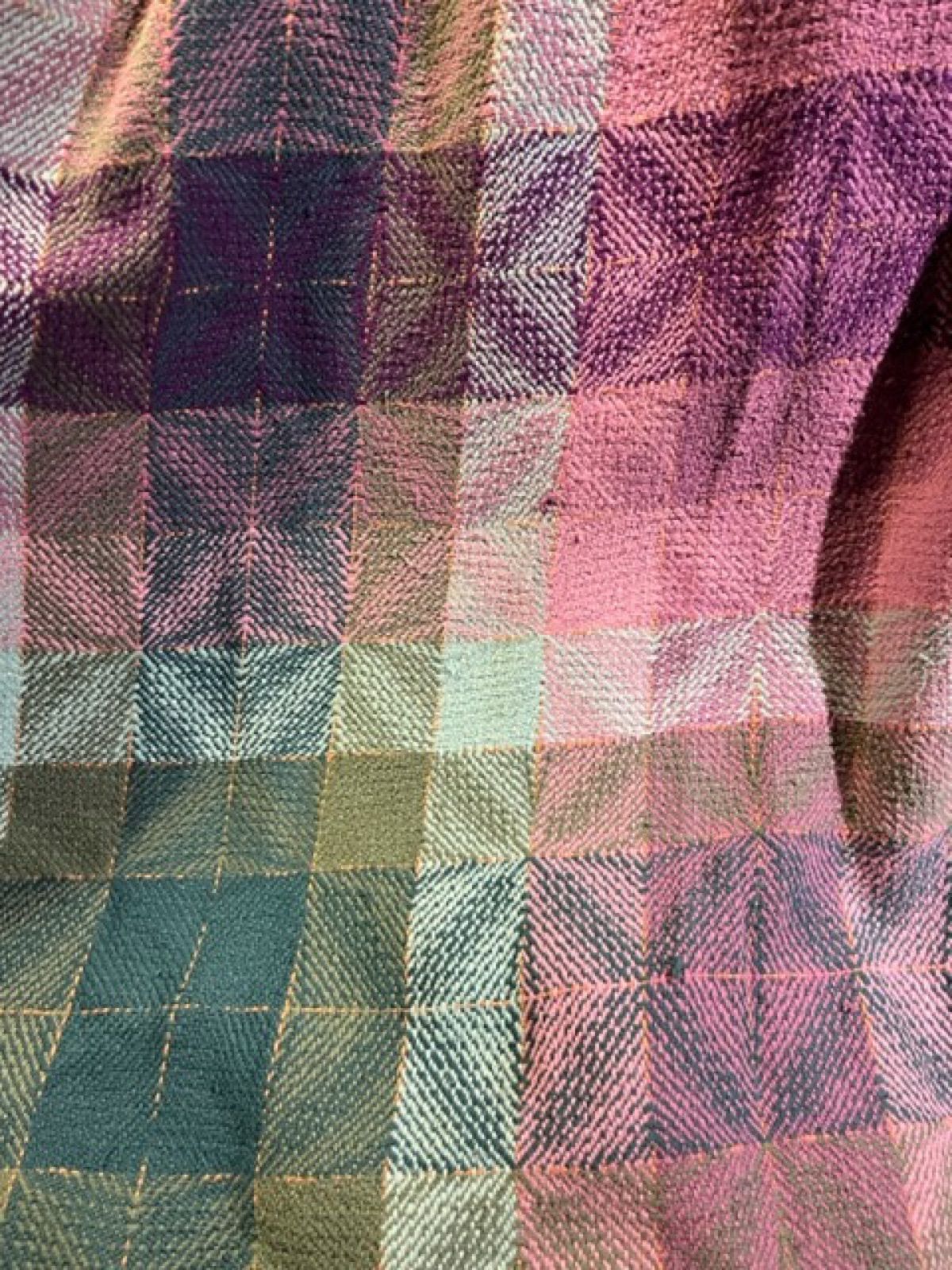 Nancy's favorite blanket — a complex pattern, the colors mixing and interacting